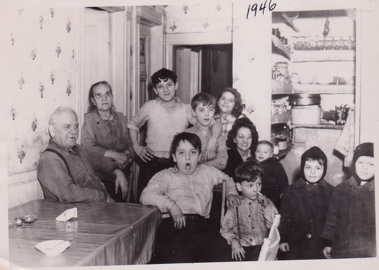 Cavallone and Rispoli family gathered in the kitchen, 1946