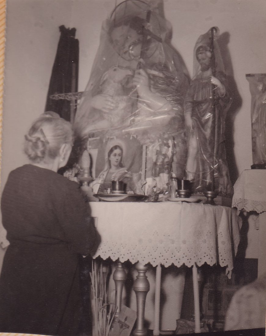 Mama Rosa at her home altar